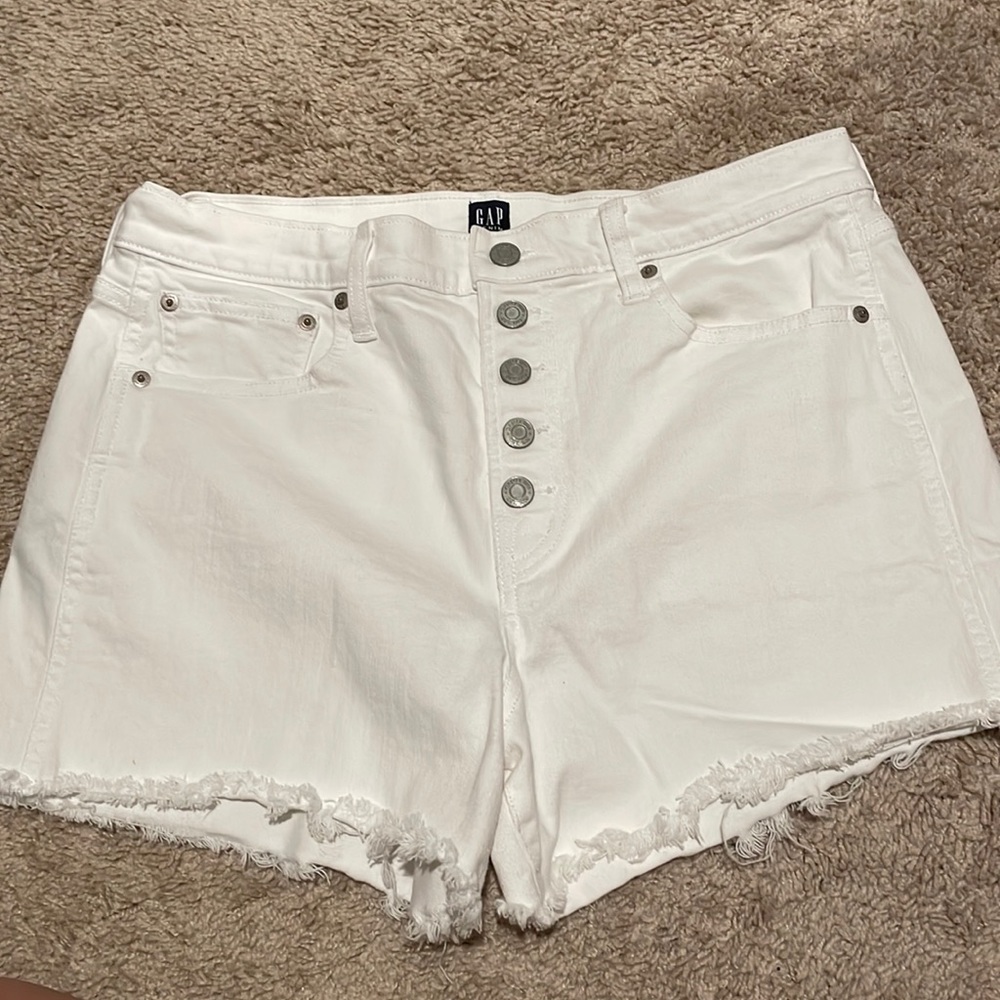 Like new, Gap Womens size 31, 12. White, high rise button fly, cutoff shorts.